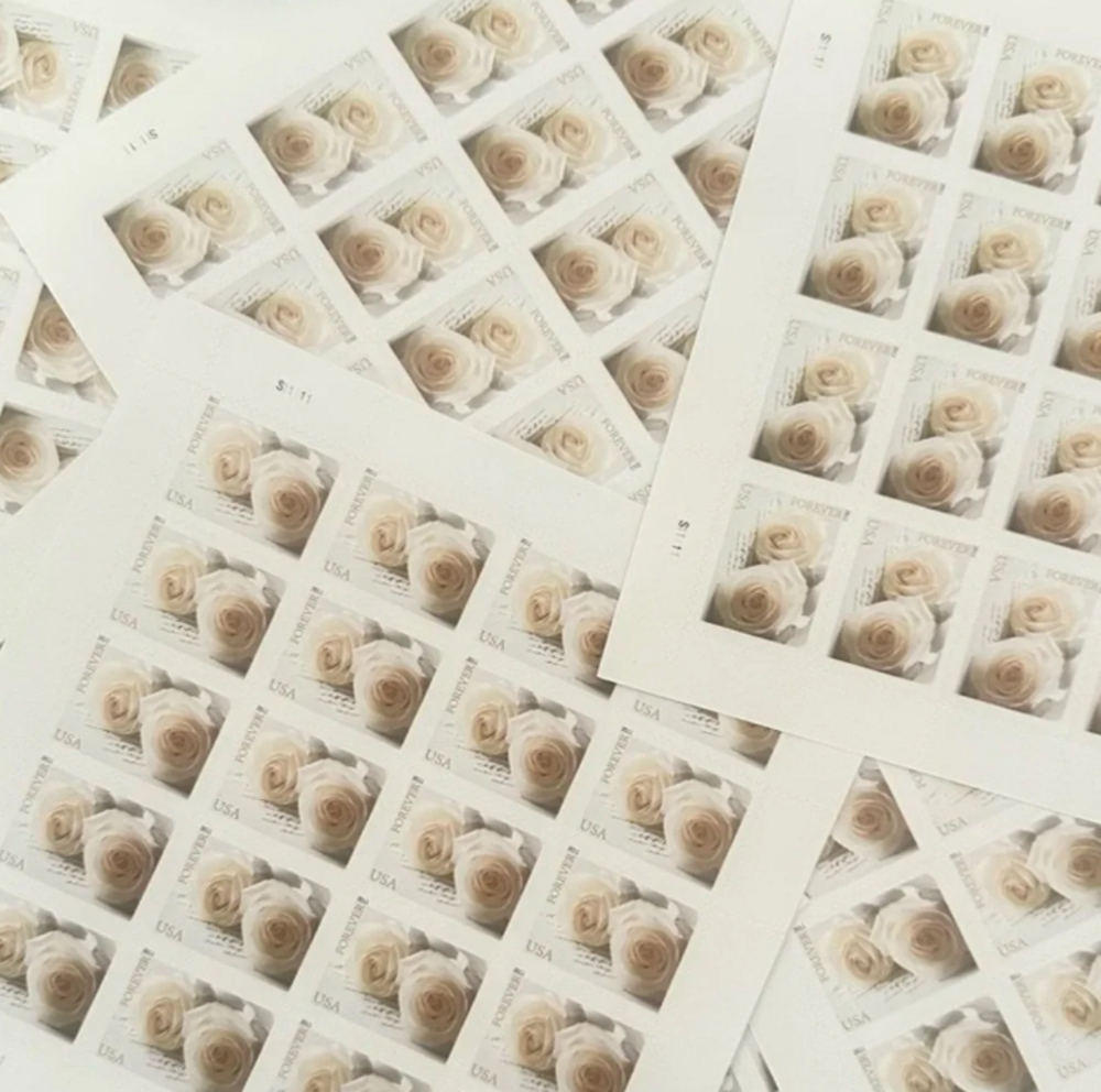 200 wedding-themed white rose stamps.